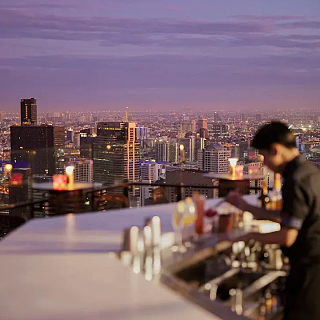 Dinner at a Rooftop Bar